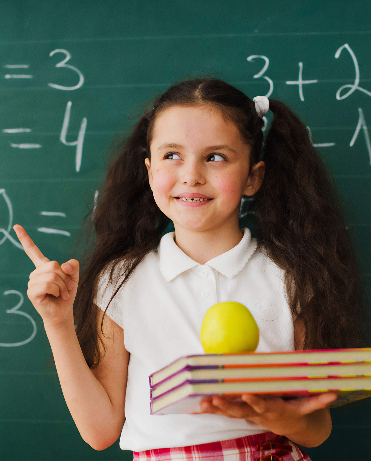 schoolgirl-pointing-up-blackboard